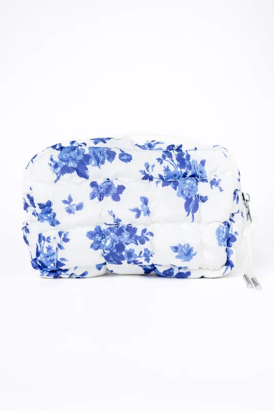Blue Floral Quilted Puffy Cosmetic Bag sold by Pink Lily