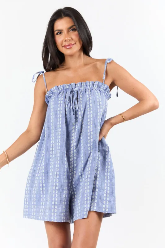 Following Along Blue Chambray Print Romper sold by Pink Lily