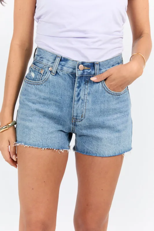 Give It A Go Medium Wash Raw Hem Denim Shorts sold by Pink Lily