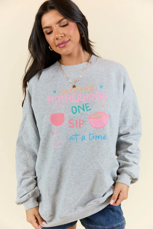 Surviving Motherhood Light Grey Graphic Sweatshirt sold by Pink Lily
