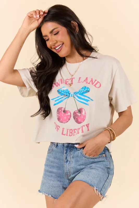 Sweet Land of Liberty Bone Graphic Tee sold by Pink Lily