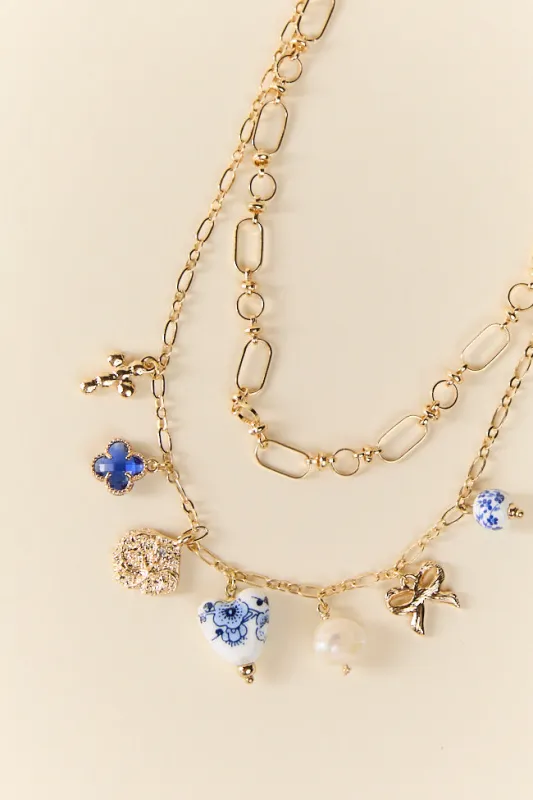 Blue Layered Ceramic Pearl Charm Necklace sold by Pink Lily