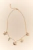 Under The Sea Gold Charm Necklace sold by Pink Lily