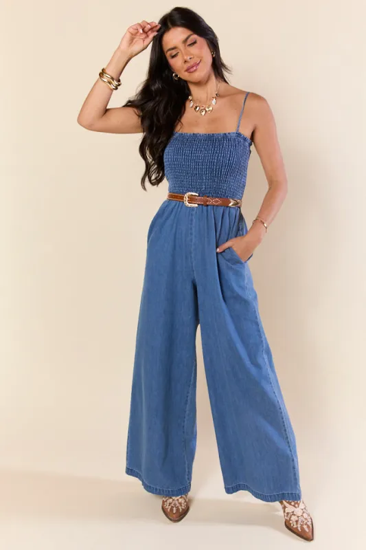 Showstopper Denim Smocked Jumpsuit SALE sold by Pink Lily
