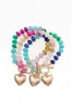 Multi Gemstone Charm Bracelet sold by Pink Lily