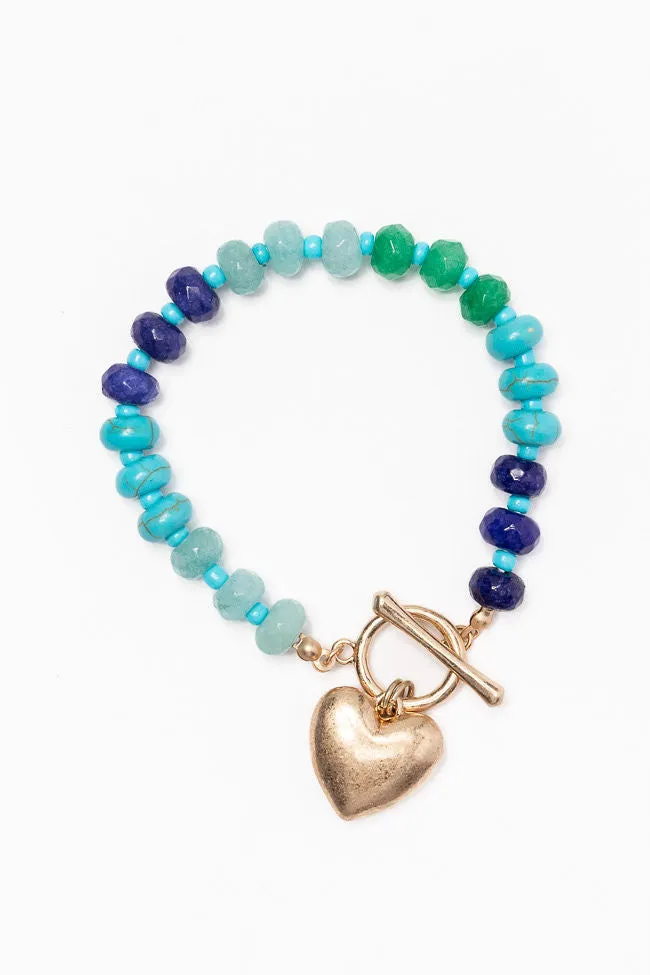 Turquoise Gemstone Charm Bracelet sold by Pink Lily