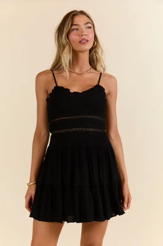 A Little Bit Fancy Black Smocked Bodice Mini Dress FINAL SALE sold by Pink Lily