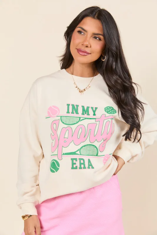 In My Sporty Era Cream Graphic Sweatshirt sold by Pink Lily