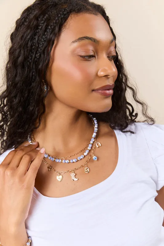 Hanna Blue Beaded Charm Necklace sold by Pink Lily