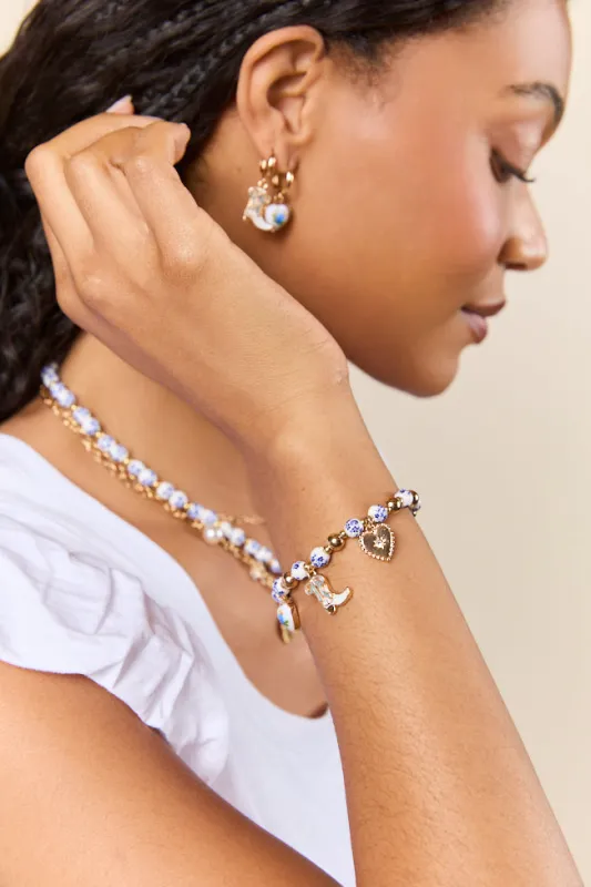 Hanna Blue Beaded Charm Stretch Bracelet sold by Pink Lily