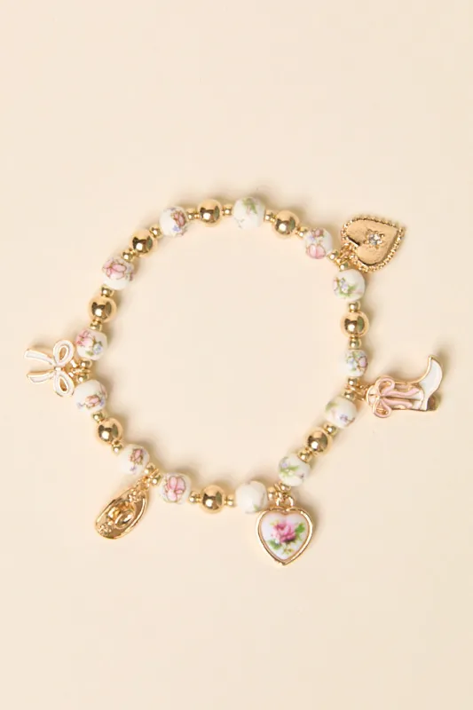Hanna Pink Beaded Charm Stretch Bracelet sold by Pink Lily