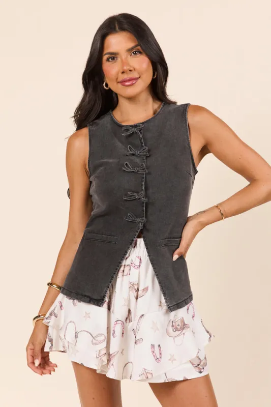 Western Ties Black Bow Denim Vest sold by Pink Lily