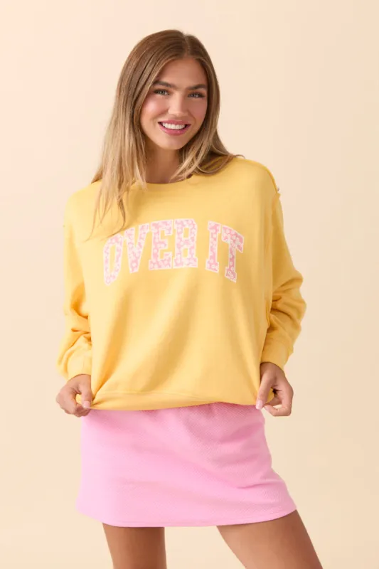 Over It Daisy Print Yellow Raw Hem Fleece Graphic Sweatshirt sold by Pink Lily