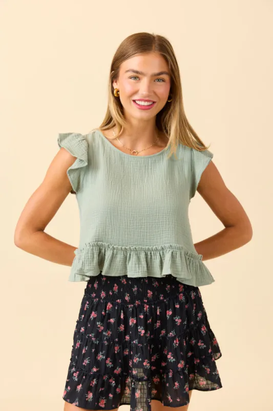 Ruby Seafoam Green Gauze Flutter Button Back Woven Blouse sold by Pink Lily