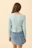 Susan Green Long Sleeve Peplum Knit Top sold by Pink Lily