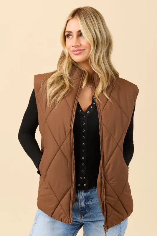 Dora Chocolate Quilted Puffer Vest sold by Pink Lily