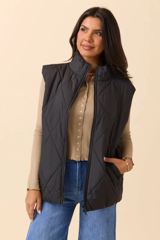 Dora Black Quilted Puffer Vest sold by Pink Lily