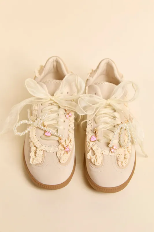 April Cream Shoe Charm Sneakers sold by Pink Lily
