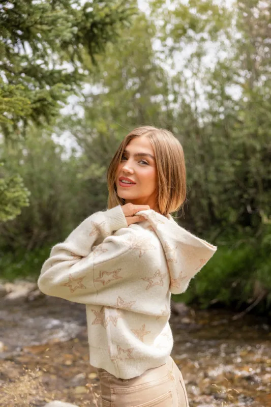 June Star Print Zip Up Sweater sold by Pink Lily