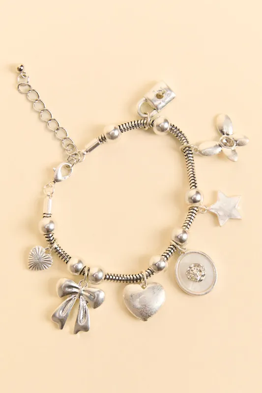 Noelle Silver Charm Bracelet FINAL SALE sold by Pink Lily