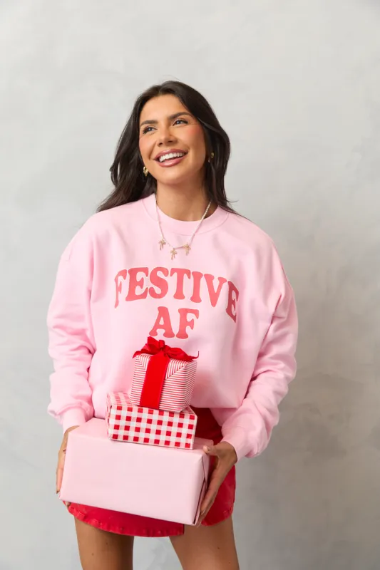 Festive AF Light Pink Graphic Sweatshirt sold by Pink Lily