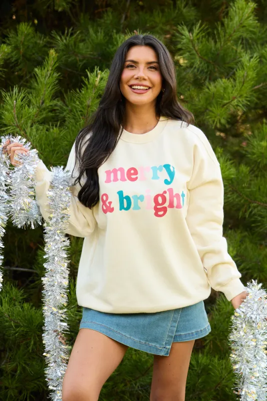 Merry & Bright Cream Graphic Sweatshirt sold by Pink Lily