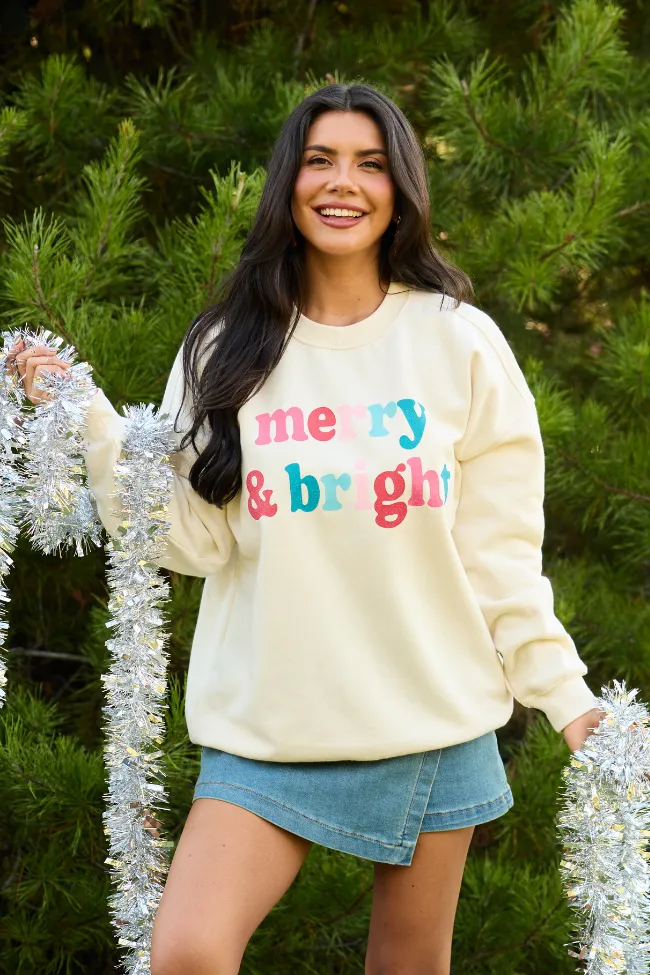 Merry & Bright Cream Graphic Sweatshirt sold by Pink Lily