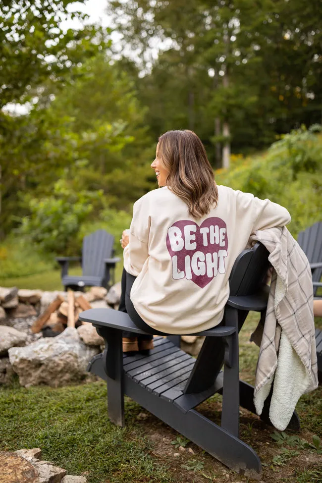 Be The Light Cream Graphic Sweatshirt Emily Fauver X Pink Lily sold by Pink Lily
