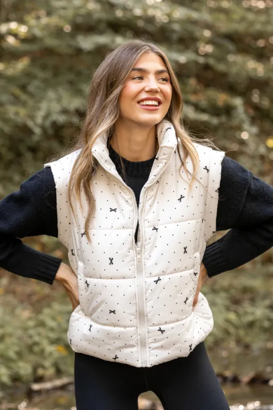 Stella White Bow Dot Puffer Vest sold by Pink Lily