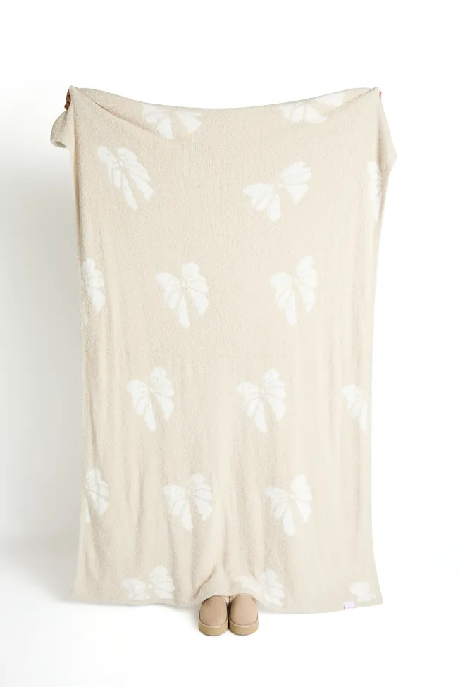 Make Me Believe Take A Bow Natural Blanket sold by Pink Lily
