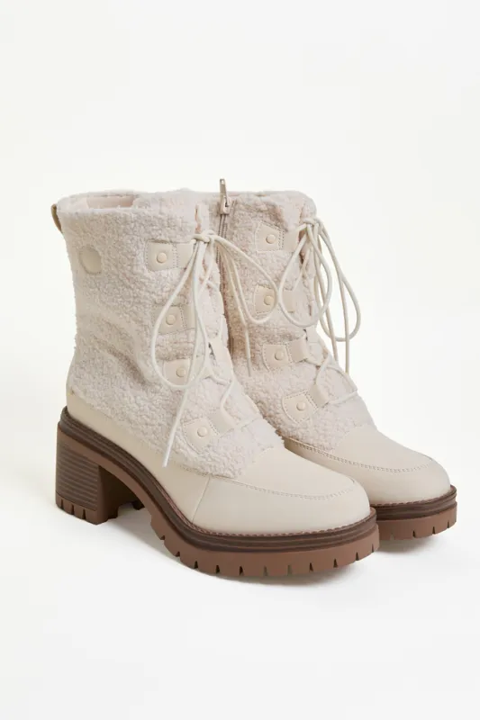 Alpes Ivory Shearling Boots sold by Pink Lily