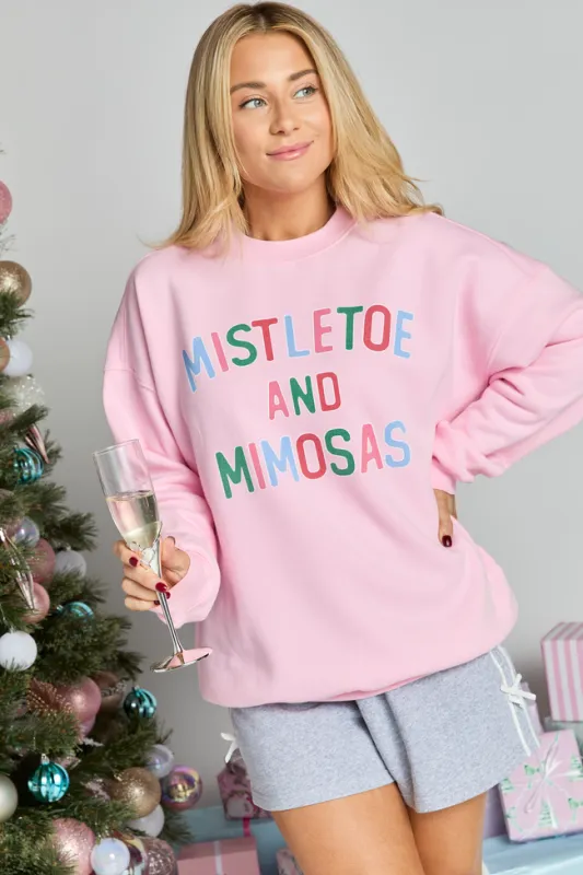Mistletoe and Mimosas Light Pink Graphic Sweatshirt sold by Pink Lily