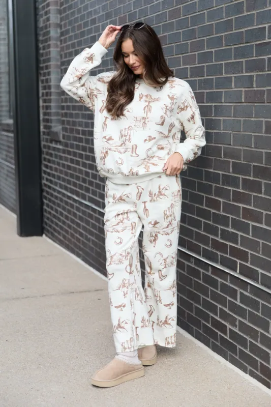 Chyenne Cream Western Sweatpants sold by Pink Lily