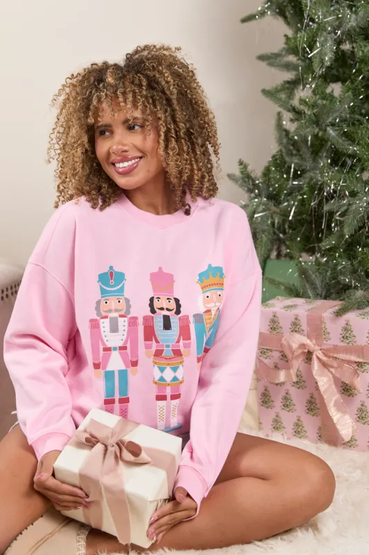 Nutcrackers Light Pink Graphic Sweatshirt made by Pink Lily