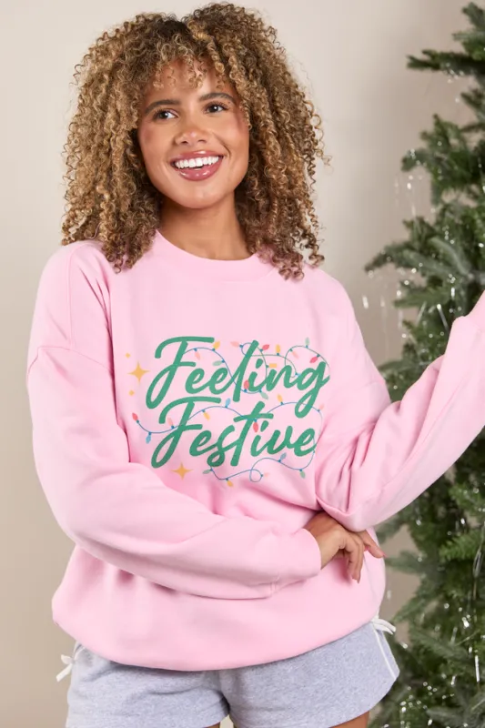 Feeling Festive Lights Light Pink Graphic Sweatshirt sold by Pink Lily