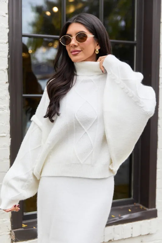 Lindy Ivory Turtleneck Sweater sold by Pink Lily