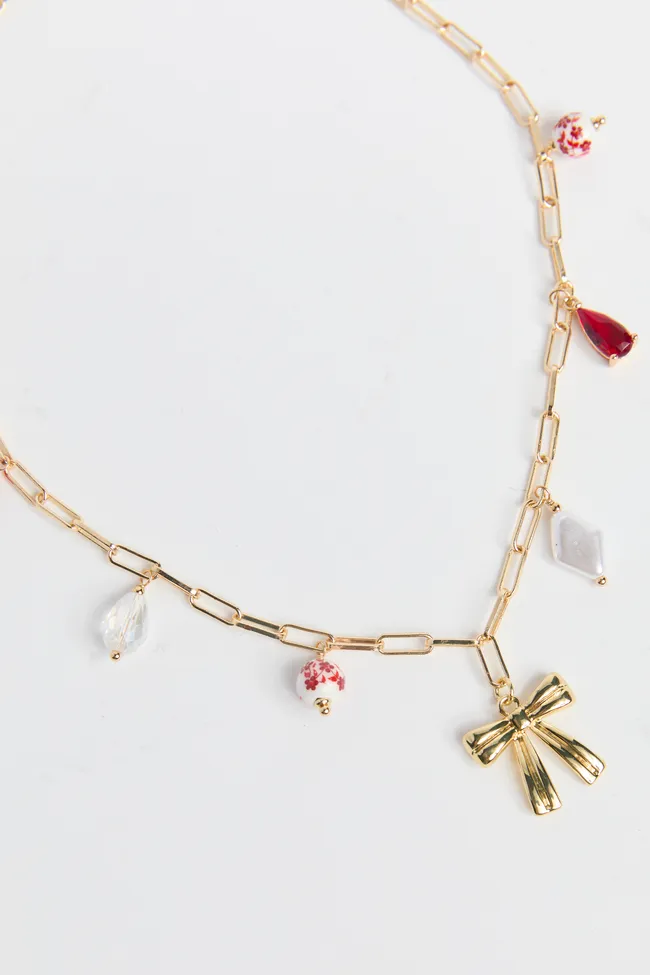 Cassian Red Bow Charm Necklace sold by Pink Lily product image thumbnail 2
