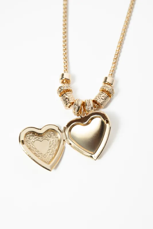 Enzo Gold Heart Locket Necklace sold by Pink Lily