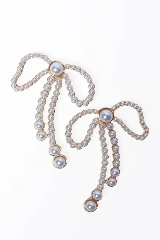 Imogene Pearl Bow Earrings sold by Pink Lily
