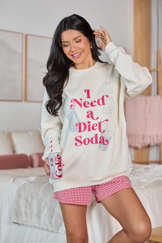 I Need A Diet Soda Cream Graphic Sweatshirt made by Pink Lily