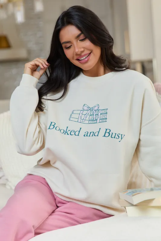 Booked & Busy Cream Graphic Sweatshirt made by Pink Lily