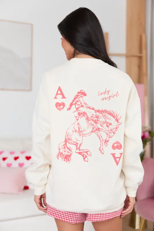 Lucky Cowgirl Cream Graphic Sweatshirt made by Pink Lily