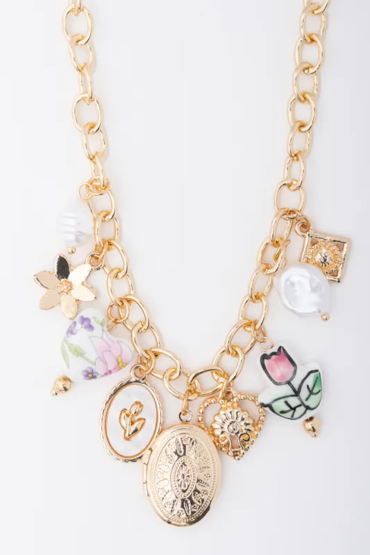 Emilia Gold Charm Necklace sold by Pink Lily