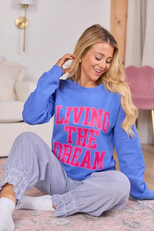 Living The Dream Heather Blue Graphic Sweatshirt sold by Pink Lily