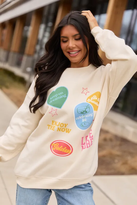Positive Stickers Cream Graphic Sweatshirt sold by Pink Lily