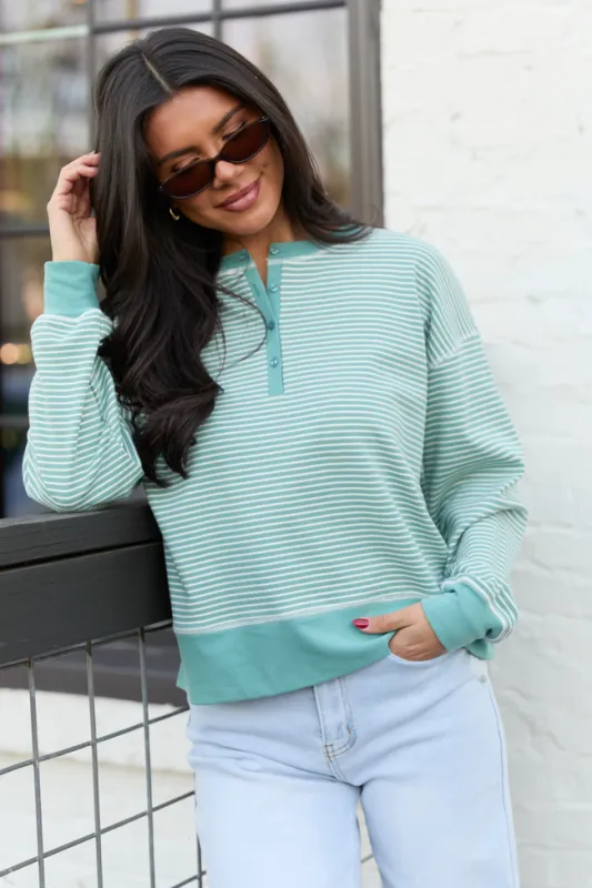 Blake Sage Green And White Striped Henley Top sold by Pink Lily