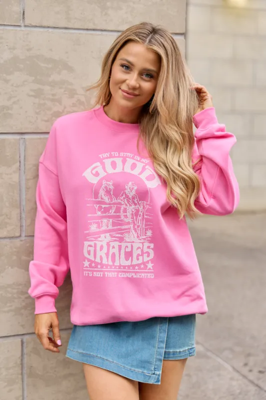 Good Graces Pink Graphic Sweatshirt made by Pink Lily