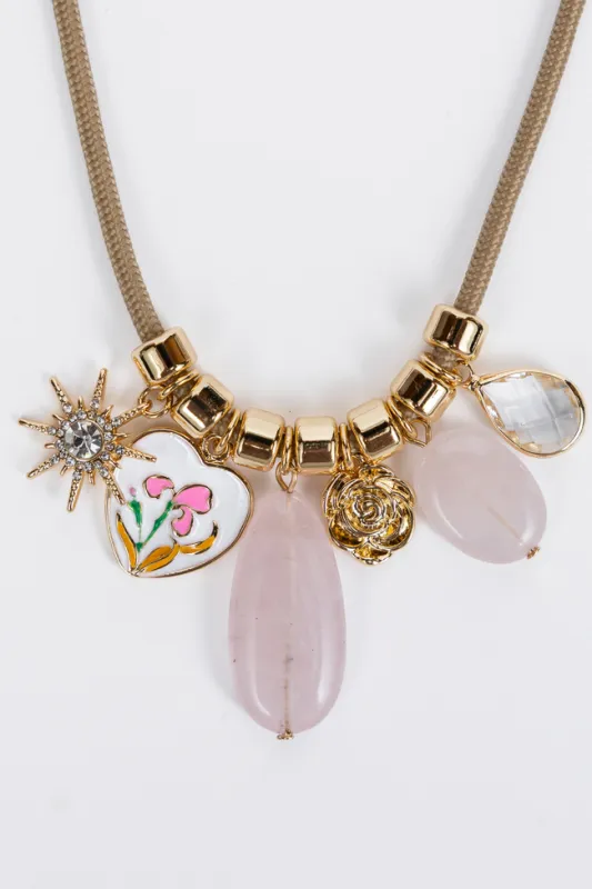Clara Pink Charm Necklace sold by Pink Lily