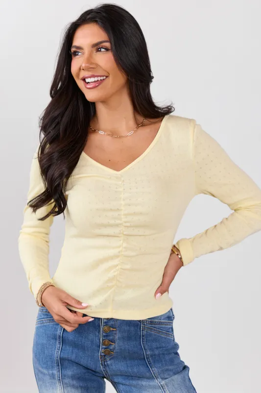 Lillian Yellow Ruched Front Long Sleeve Top made by Pink Lily