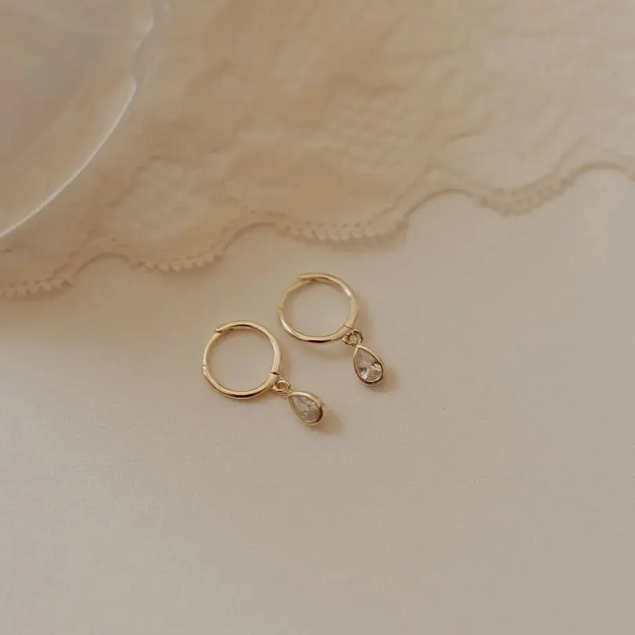 April Raindrop Dangle Hoop Earrings sold by Pink Lily